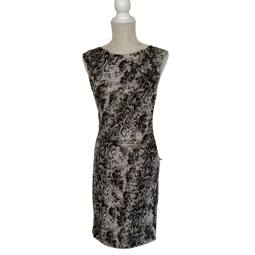 Size small cache animal print  knee length dress with golden accent zippers